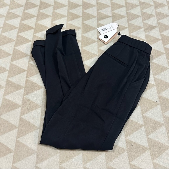 Universal standard cuffed cigarette twill pants in black - Picture 1 of 2